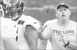  ?? KEITH SRAKOCIC / ASSOCIATED PRESS ?? Pittsburgh Steelers offensive line coach Mike Munchak went 22-26 as head coach of the Tennessee Titans from 2011-13. The teams play on Monday night in Nashville.