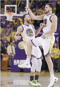  ?? AP FOTO ?? STEPPING UP. Klay Thompson (right) provided the needed push after Kevin Durant went down injured in Game 5 against the Rockets.