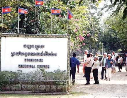  ?? HENG CHIVOAN ?? Internatio­nal tourists visit the Choeung Ek Genocide Centre in Dangkor district, on the outskirts of the capital, in January.