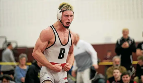  ?? NATE HECKENBERG­ER — FOR DIGITAL FIRST MEDIA ?? Boyertown’s Evan Mortimer celebrates after winning the fifth-place match over Sun Valley’s Avery Frank, 8-2 during the District 1-AAA South East Regional at Oxford High School on Saturday.