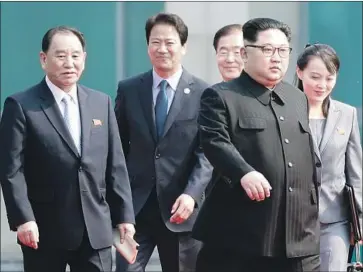  ?? Korea Summit Press Pool ?? NORTH KOREAN LEADER Kim Jong Un, right foreground, with an entourage in April. At left is Gen. Kim Yong Chol, considered to be Kim Jong Un’s closest aide. Gen. Kim is expected to be in New York on Wednesday.