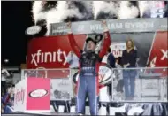  ?? TERRY RENNA — THE ASSOCIATED PRESS ?? William Byron celebrates in Victory Lane after winning the NASCAR Xfinity Series auto racing season championsh­ip, Saturday at Homestead-Miami Speedway in Homestead, Fla.