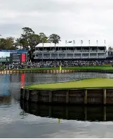  ?? ?? Above Twenty-nine golf balls found the drink on the par-3 17th at TPC Sawgrass on Saturday. The hole played 66 shots over par.