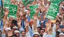  ?? AP ?? Supporters of the Jamaat-e-Islami party during a rally to protest the court ruling in the Asia Bibi case.