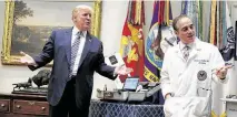  ?? Associated Press file photo ?? David Shulkin, right, who was fired as VA secretary by President Trump, fears outsourcin­g will hurt the system.