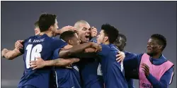  ?? FABIO FERRARI — LAPRESSE VIA AP ?? Porto players celebrate after defeating Juventus in Tuesday’s Champions League match.