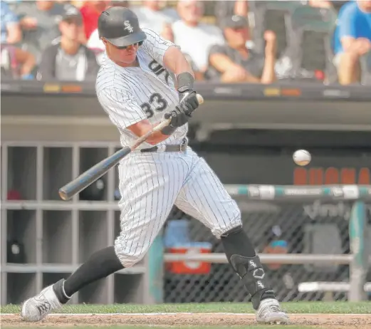  ?? CHARLES REX ARBOGAST/AP ?? Sox catcher James McCann hits a grand slam off Astros reliever Ryan Pressly in the eighth inning Wednesday at Guaranteed Rate Field.