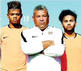  ?? FILE ?? Phoenix Academy founder Craig Butler (centre) and standout players Leon Bailey (left) and Kyle Butler, his sons.