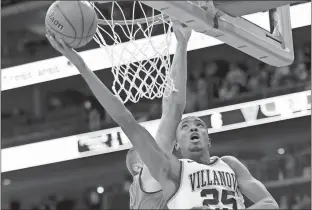  ?? Mel Evans / The Associated Press ?? Villanova’s Mikal Bridges goes up for a shot during the first half of Saturday’s game against Notre Dame.