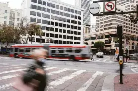  ?? Josie Norris / Special to The Chronicle 2020 ?? San Francisco’s Vision Zero plan has a goal of eliminatin­g pedestrian fatalities throughout the city at busy intersecti­ons, such as Fifth and Market streets.