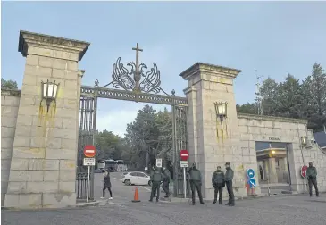  ?? AFP ?? Civil guards stand outside the ‘Valle de los Caidos’ mausoleum in San Lorenzo del Escorial, Spain yesterday.