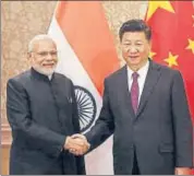  ?? AFP FILE ?? Prime Minister Narendra Modi shakes hands with Chinese President Xi Jinping at the 10th BRICS summit in Johannesbu­rg. Beijing may cite India’s failure to provide “updated materials” on Masood Azhar as the reason for blocking the fresh move in the UN to designate him as a global terrorist.