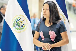  ??  ?? Tania Avalos, whose husband Oscar Martinez died alongside their toddler daughter trying to cross the Rio Grande, at a press conference in El Salvador