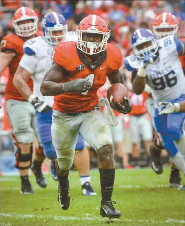  ?? John Amis/AP ?? Georgia running back Sony Michel (1) rushes against Kentucky during the second half