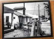  ?? Michael Starghill Jr. ?? A photo of the original location of Shepherd Drive Barbecue Stand hangs on the wall of what would become Pizzitola’s BBQ.