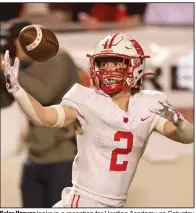  ?? (Arkansas Democrat-Gazette/Colin Murphey) ?? Kyler Hoover looks in a reception for Harding Academy on Saturday night. Hoover finished with 5 catches for 102 yards with touchdown receptions of 27 and 61 yards.