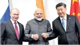  ??  ?? File photo of Putin (L), Modi and Xi(R)