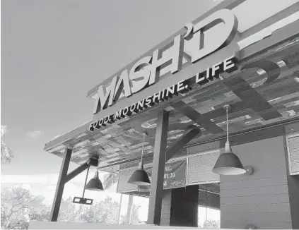  ?? MICHAEL MAYO/SUN SENTINEL PHOTOS ?? Mash'd, a restaurant chain from Texas that bills itself as "rebellious American," is scheduled to open Feb. 20 at the Tower Shops in Davie.