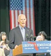  ?? WILFREDO LEE/AP ?? Florida Gov. Rick Scott, running for U.S. Senate, said Friday during a campaign stop in Hialeah: “When I get to D.C., I’ll return your phone calls. I’ll work my butt off.”