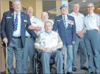  ?? CHRISTIAN ROACH/CAPE BRETON POST ?? Fred Arbuckle, from left, Bill Timbury, Butch MacNeil (wheelchair), Jack Royale, Jack Griffin, Don Gardiner and Michele Gardiner, who are members of the Major General Lewis MacKenzie Chapter of the Canadian Associatio­n of Veterans in United Nations...