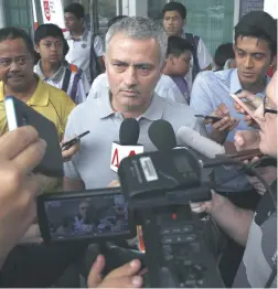  ?? REUTERS ?? IF IT’S WEDNESDAY, IT MUST BE SINGAPORE: Jose Mourinho being interviewe­d on a trip to the city-state yesterday.