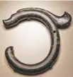  ??  ?? Hongshan Culture C-Shaped Jade Dragon
Collection: Ongniud Banner Museum Period: Neolithic era