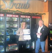  ?? Photo by Beth Koop ?? Ombudsman for Employer Support of the Guard and Reserve (ESGR), Eric Story presents Straub Brewery Vice President of Sales, Marketing and Public Relations, Cathy Lenze with the ESGR Patriot Award.