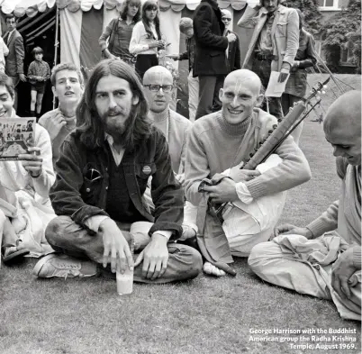  ??  ?? George Harrison with the Buddhist American group the Radha Krishna
Temple, August 1969.