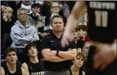  ?? ?? Rock Canyon head coach Kent Grams watches during a game against Mountain Vista in February.