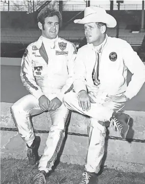  ?? IMS ?? Al, left, and brother Bobby Unser prepare for the 1972 Indiana Classic 100- mile USAC stock car race at the Indiana State Fairground­s. Al won four Indy 500s.