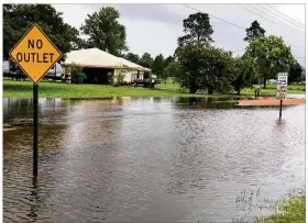  ?? CARRIE CUCHENS VIA AP ?? Floodwater pools near homes in St. Martinvill­e, La. on Sunday in the aftermath of Tropical Storm Barry.