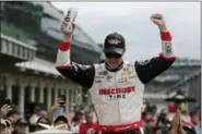  ?? MICHAEL CONROY — ASSOCIATED PRESS ?? NASCAR Cup Series driver Brad Keselowski celebrates after winning the Brickyard 400 at Indianapol­is Motor Speedway on Monday.