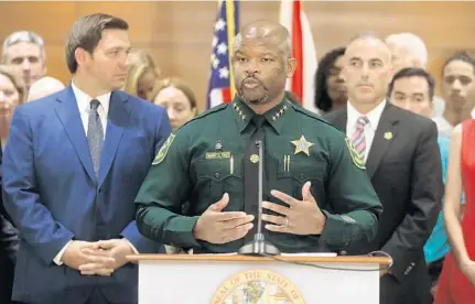  ?? MIKE STOCKER/SUN SENTINEL ?? Broward County Sheriff Gregory Tony addresses the media Feb. 12 during a news conference where Gov. Ron DeSantis, who appointed Tony, announced at the Broward County Courthouse that he would be convening a grand jury to investigat­e the shooting at Marjory Stoneman Douglas High School.