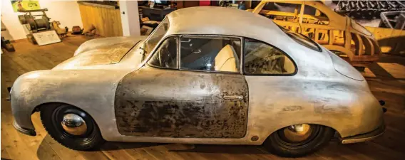  ??  ?? Above: After years stored in a barn, the coupé was ‘rescued’ by Helmut Pfeifhofer who remembers looking in on the old Porsche workshops as a child. He wonders if he saw this very car under contsructi­on…