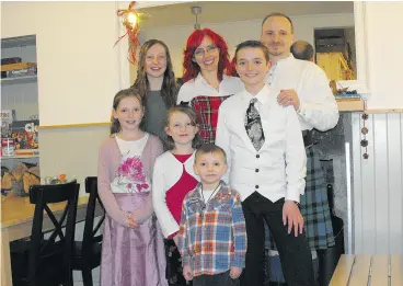  ??  ?? Jason and Christy Zielsdorf and their five children are facing deportatio­n despite a long-running campaign by locals to allow the family to remain in Scotland.