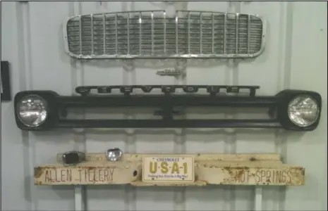  ??  ?? Steel bumpers were one of the earliest ways that Allen Tillery advertised his dealership. This bumper hangs in his personal shop.