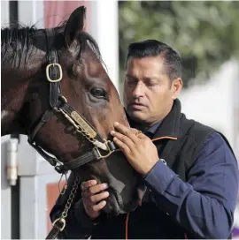  ??  ?? STRONG HAND. Trainer Satish Seemar will bring a powerful string of runners to Meydan when racing returns to Dubai tomorrow.