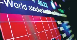  ?? — Reuters ?? A headline in electric quotation shows world stocks tumble when Britain's shock vote to leave the European Union drove sterling to a 31-year low against the dollar.