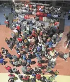  ?? ADAM CAIRNS/COLUMBUS DISPATCH ?? Fans line up to purchase NCAA final four merchandis­e at Nationwide Arena.