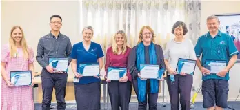  ?? Photo / Supplied ?? Te Whatu Ora MidCentral Allied Health Award winners Lucy Rowe (left), Lisheng Liu, Emma Westberry, Mandy Smith, Andrea Howard, Lorraine Welman (on behalf of the pharmacy team), and John Carruthers.