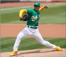  ?? AP PHOTO/JEFF CHIU ?? Oakland Athletics’ Jesus Luzardo pitches against the Baltimore Orioles during the first inning of a baseball game in Oakland, Calif., on Saturday.