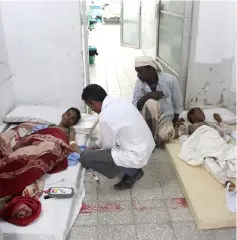  ??  ?? Boys, injured by air strikes while attending a wedding in a village in northweste­rn Yemen, lie on beds at a hospital in Hajjah. — Reuters photo