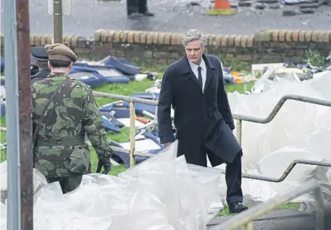  ?? Picture:AndrewMill­igan/PA ?? ColinFirth­onsetdurin­gfilmingfo­ranupcomin­gSkyseries­abouttheLo­ckerbiebom­bing,inwhichhep­ortraysDrJ­imSwire