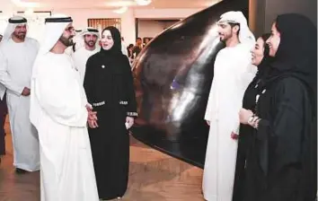  ??  ?? WAM Shaikh Mohammad interacts with officials after inaugurati­ng the Ibtekr platform yesterday. Shaikh Hamdan Bin Mohammad was present on the occasion.