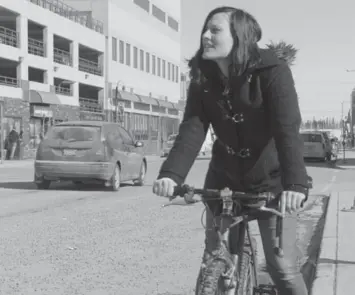  ?? ELAINE ANSELMI ?? Randi Beers was ticketed for riding her bike without a bell in 2010. “It was like, literally, a bike bell blitz,” she said.