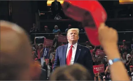  ?? Mandel Ngan AFP/Getty Images ?? PRESIDENT TRUMP’S campaign kickoff in Orlando, Fla., even included chants of “Lock her up,” referring to his last Democratic rival.