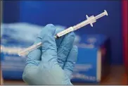  ?? ASSOCIATED PRESS FILE PHOTO ?? Closeup of the Pfizer-BioNTech COVID-19vaccine.