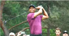  ??  ?? Tiger Woods hits his tee shot on the second hole during the Pro-Am of The Memorial Tournament Presented By Nationwide at Muirfield Village Golf Club in Dublin, Ohio. — AFP photo