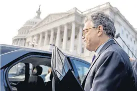  ?? [ANDREW HARNIK/THE ASSOCIATED PRESS] ?? Sen. Al Franken, D-Minn., leaves the Capitol after speaking on the Senate floor Thursday on Capitol Hill in Washington. Franken said he will resign from the Senate in coming weeks following a wave of sexual misconduct allegation­s and a collapse of...