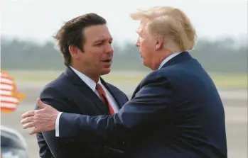  ?? EVAN VUCCI/AP 2019 ?? Florida Gov. Ron DeSantis, left, and former President Donald Trump, a pair of longtime Republican allies whose relationsh­ip is now tense, could find themselves looking to secure the GOP nomination for president in 2024.